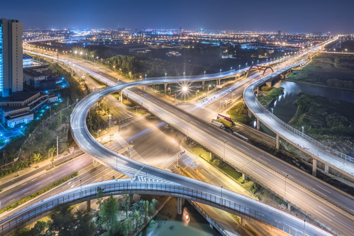 Highway interchange lit up at night