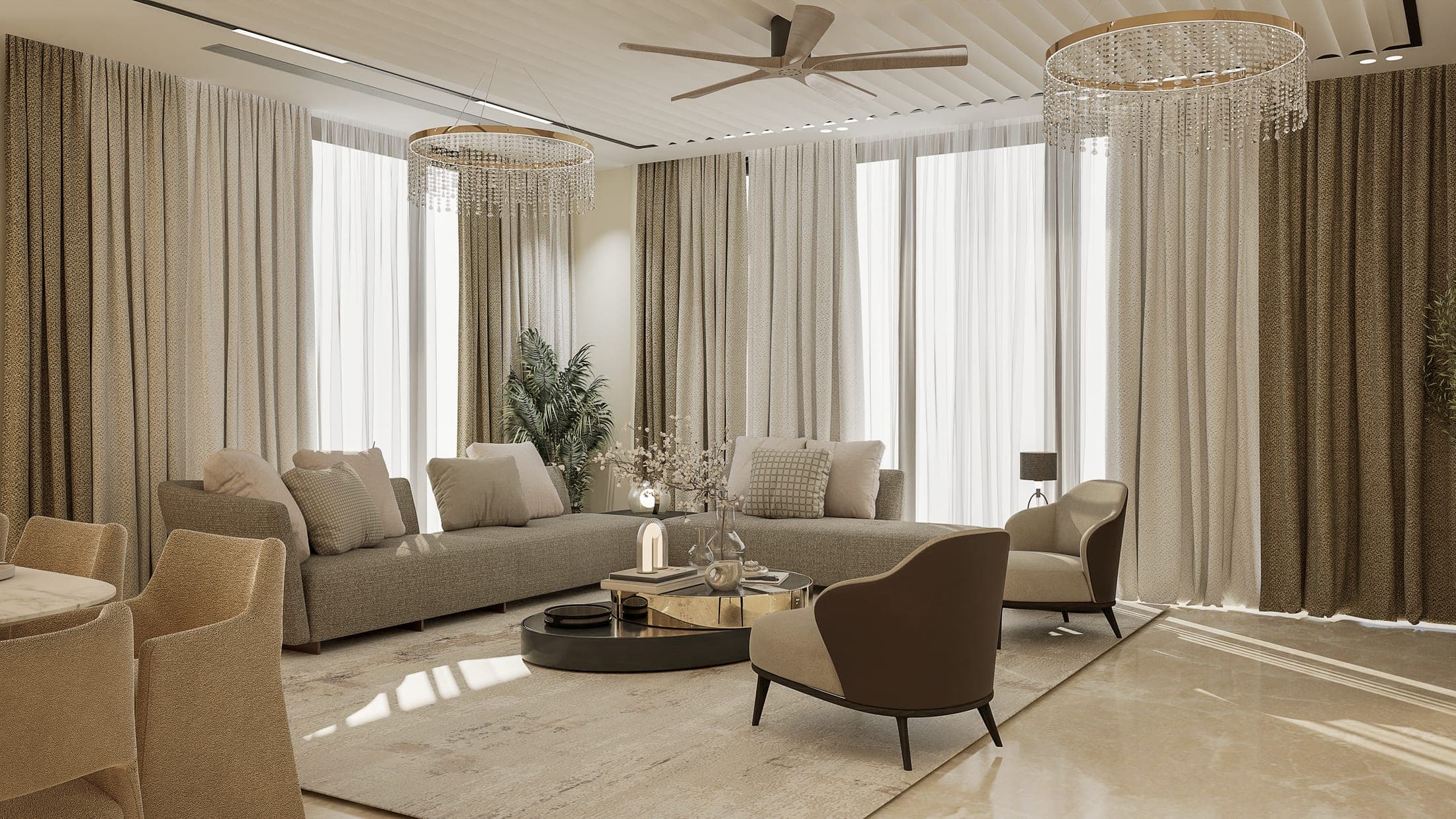 Bright living room with layered curtains, soft seating and a chandelier